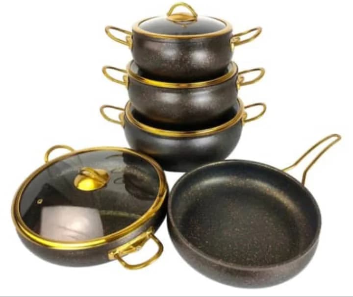 Premium Granite non-stickcookware set with gold-colored handles and rims.