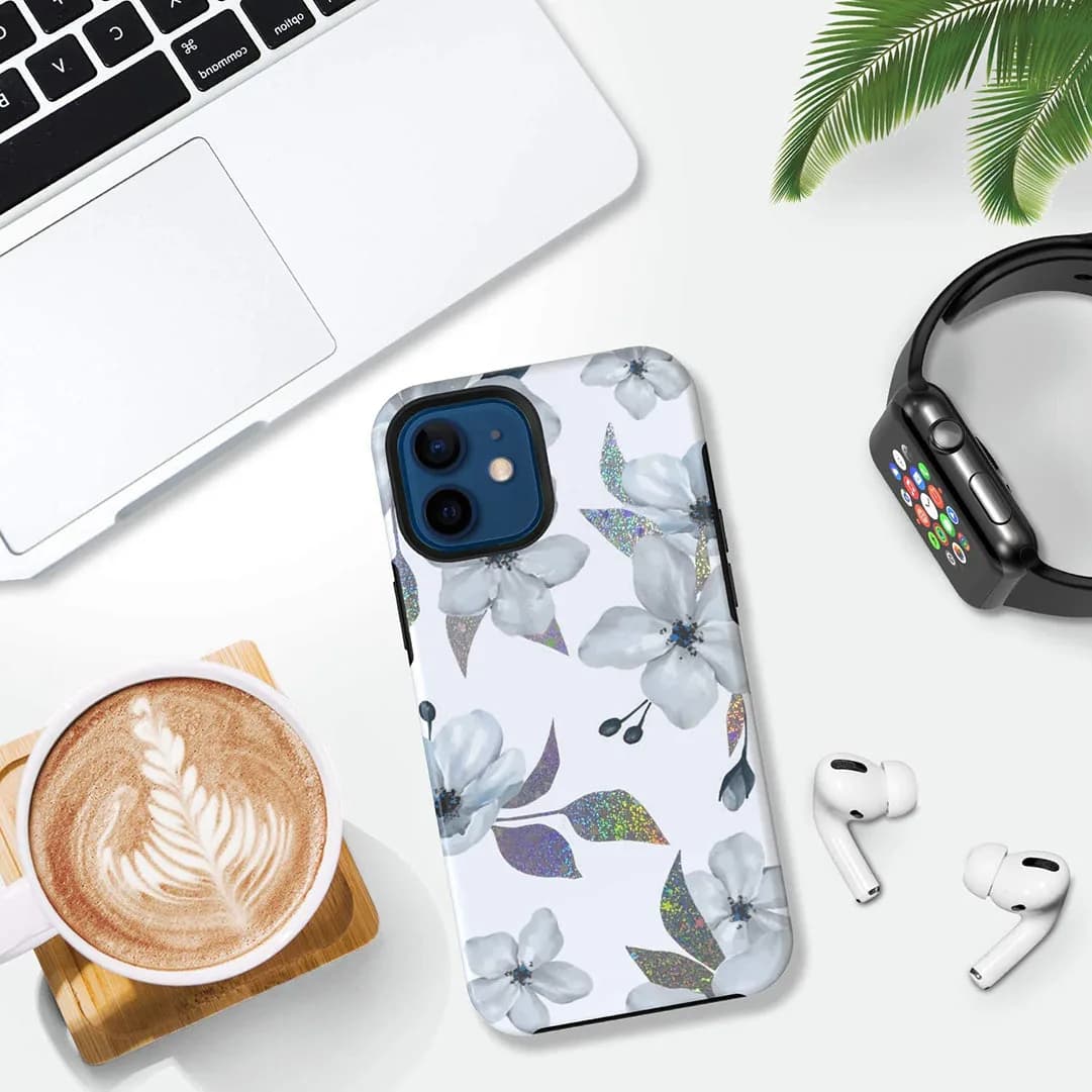 white floral phone case with glitter accents.