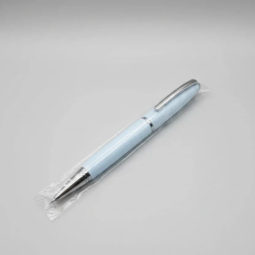 Elegant White Twist Ballpoint Pen with Metallic Accents