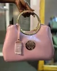 Pink Patent Leather Handbag with Gold Accents
