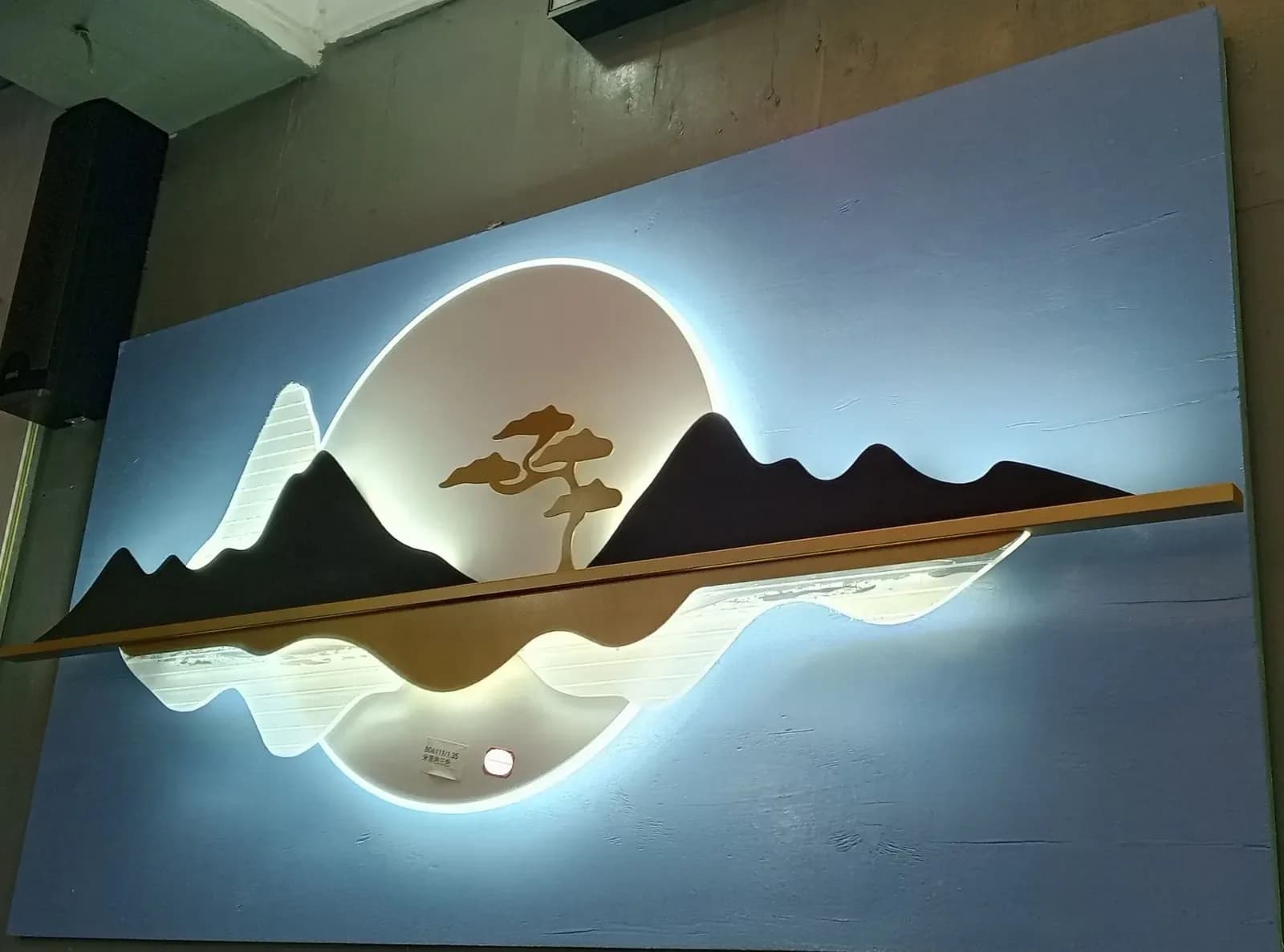 Elegant Circular Layered Artwork on Light Fixture