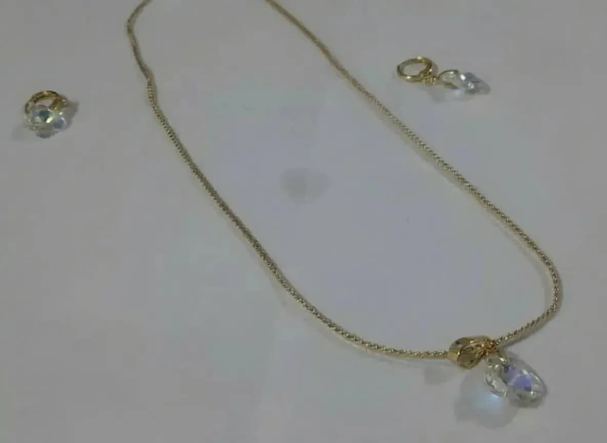 Jewelry set with shimmering transparent stone Earring and Necklace