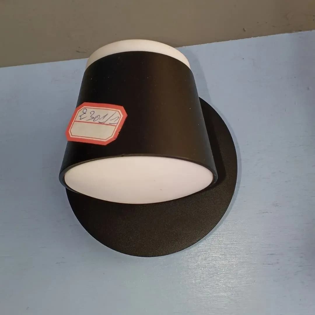 Black wall-mounted lamp