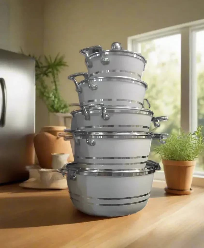 Stacked Aluminum Cooking Pot Set on Display Shelf
