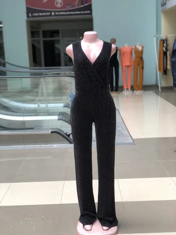 Sleeve-less sexy black jumpsuit with shinny stripes